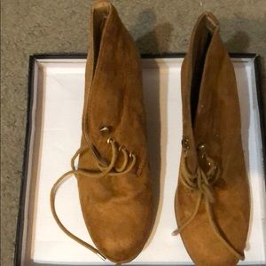 Tan laced up wedge booties